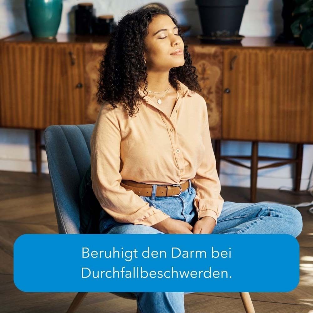 Blauer Hintergrund mit Text: Beruhigt den Darm bei Durchfallbeschwerden.