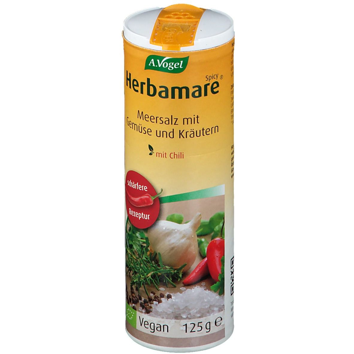 Zylindrische Dose mit A. Vogel Herbamare Spicy. Aufdruck mit Gemüse, Kräutern und Chili. Vegan-Siegel.