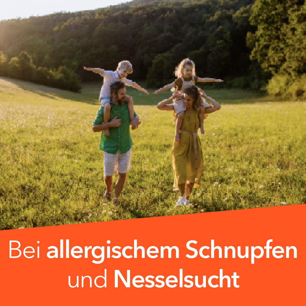 Familie im Freien. Text: Bei allergischem Schnupfen und Nesselsucht.