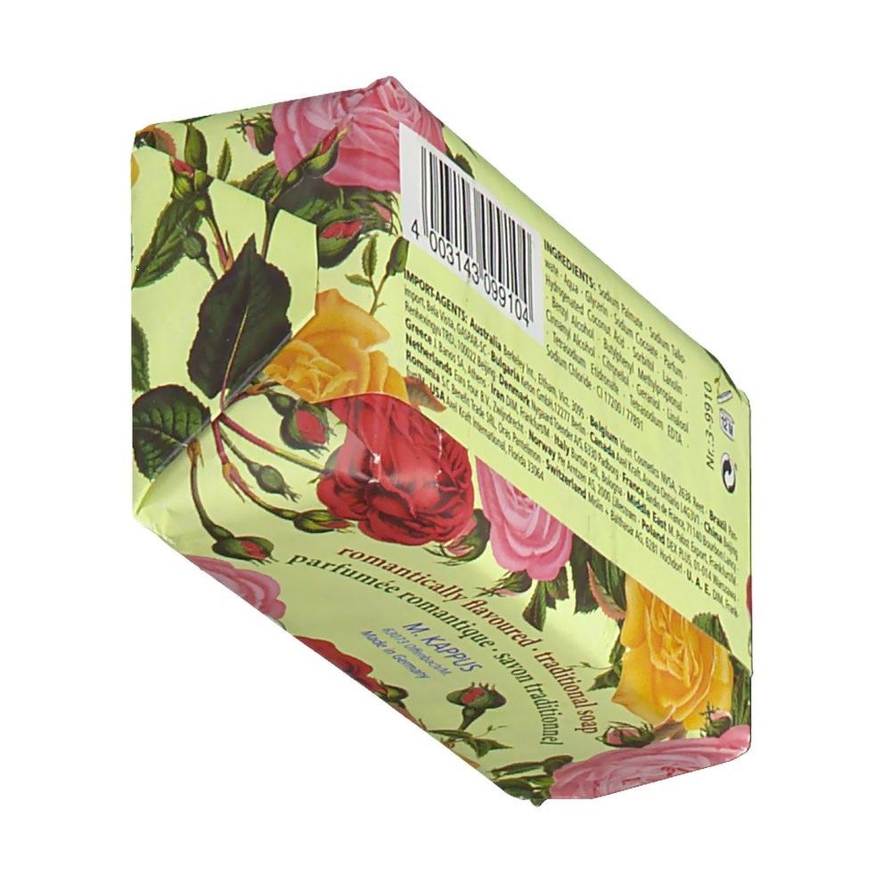 Savon emballé avec motif floral. Inscription : romantiquement parfumé, savon traditionnel. Code-barres et texte sur l'emballage.