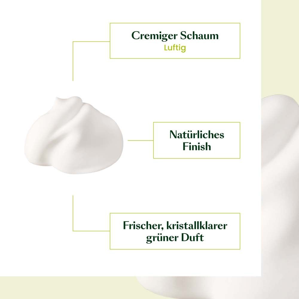 Nahaufnahme von weißem Schaum. Text: Cremiger Schaum, Natürliches Finish, Frischer, kristallklarer grüner Duft.