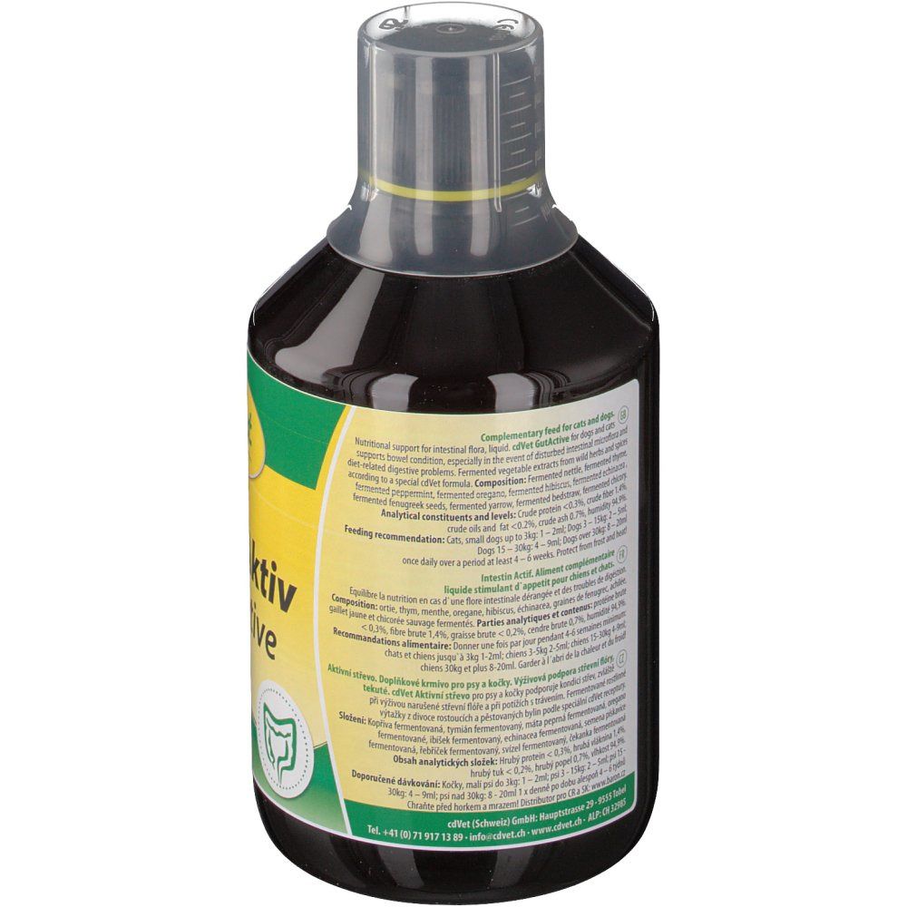 Rückseite einer Flasche mit brauner Flüssigkeit. Text in mehreren Sprachen. Transparenter Dosierverschluss.