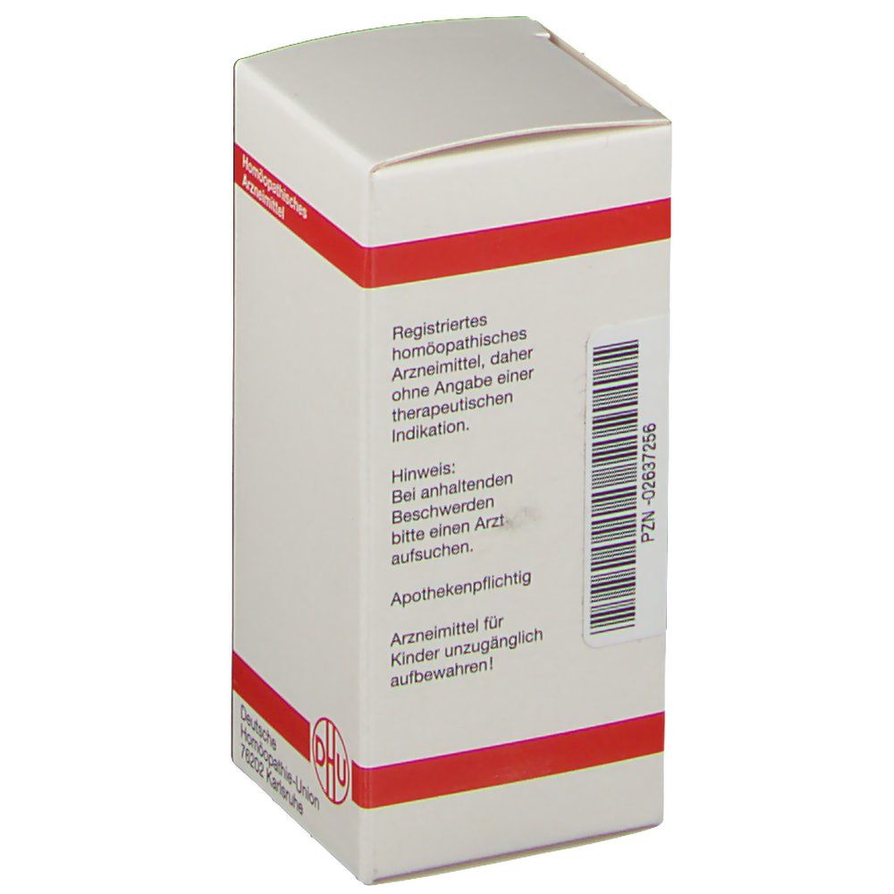 Weiße Schachtel mit rotem Streifen. Aufschrift: Registriertes homöopathisches Arzneimittel. Apothekenpflichtig. Barcode.