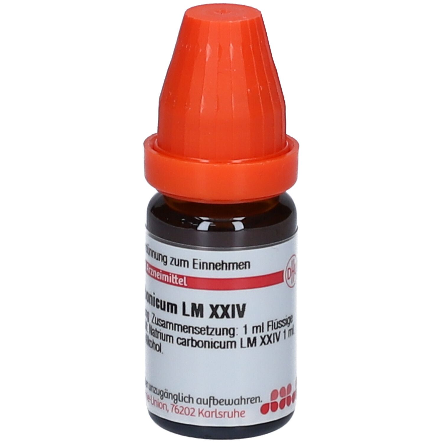 Braune Glasflasche mit orangefarbenem Verschluss. Beschriftung: Natrium carbonicum LM XXIV, 1 ml Flüssige Verdünnung. Text.