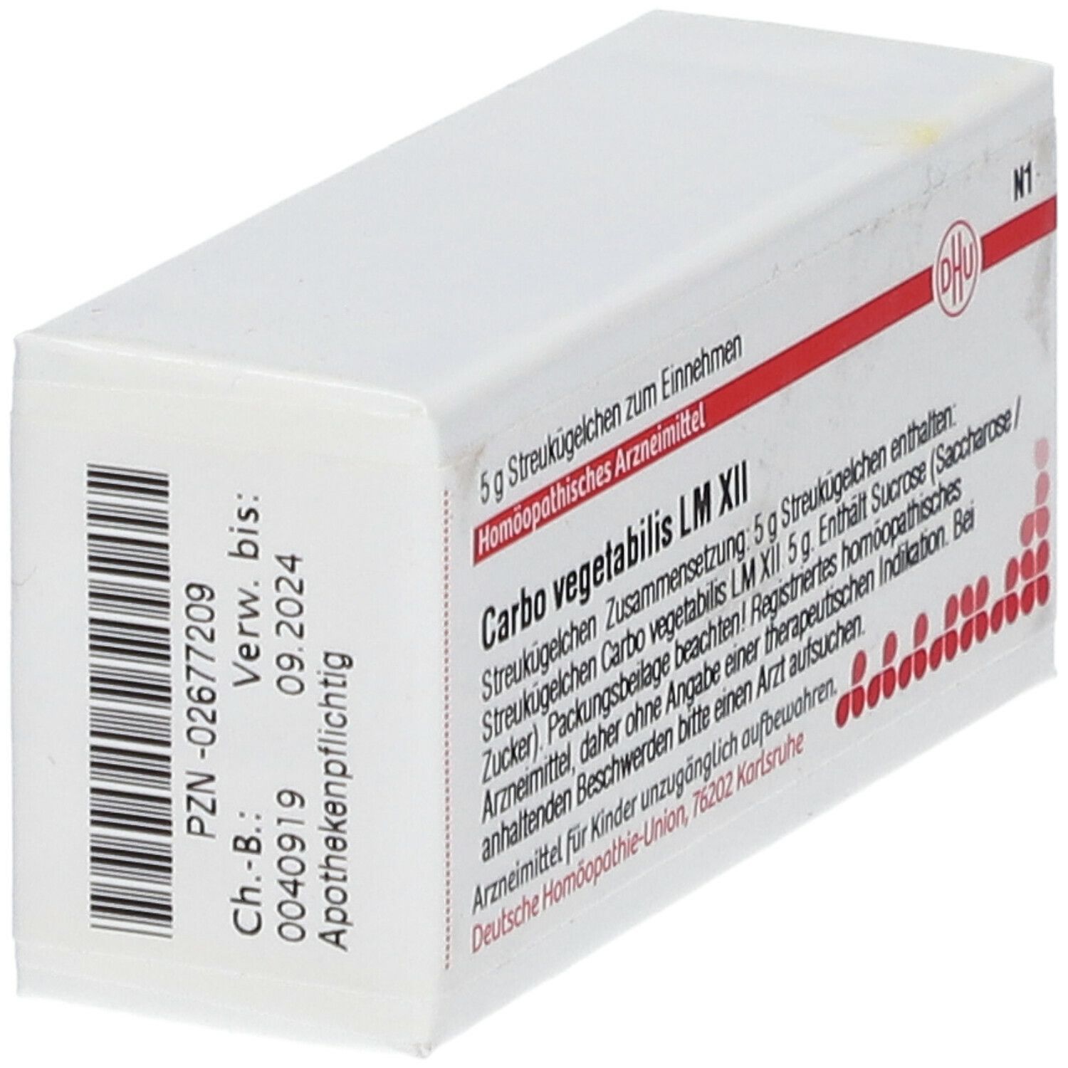 Weiße Faltschachtel mit roter Schrift. Aufschrift: Carbo vegetabilis LM XII, 5 g Streukügelchen. DHU Logo. Barcode.
