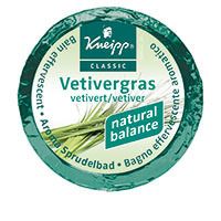 Runde, grüne Kneipp Aroma Sprudelbad-Tablette mit Text: Vetivergras, Classic, natural balance.