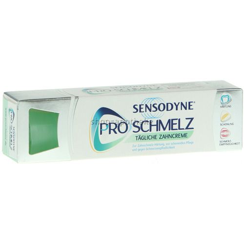 Zahncreme-Verpackung. Aufschrift: SENSODYNE PROSCHMELZ Tägliche Zahncreme. Grünliche Tube durch Sichtfenster sichtbar.