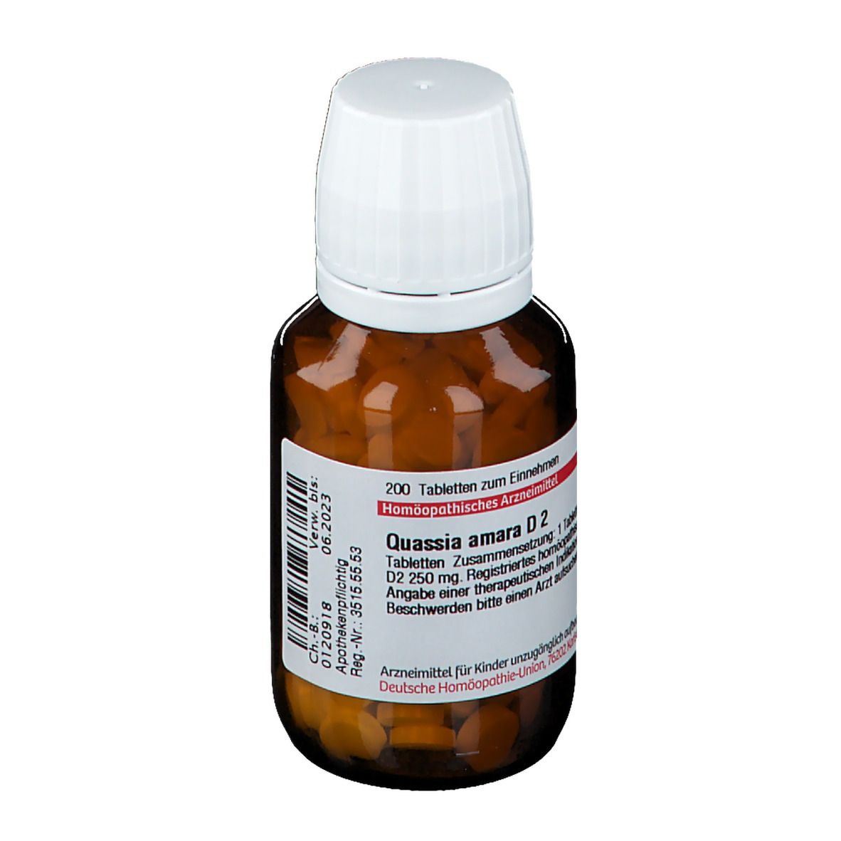 Braune Glasflasche mit weißen Tabletten. Weißer Deckel. Rotes und weißes Etikett mit Text: Quassia amara D2.