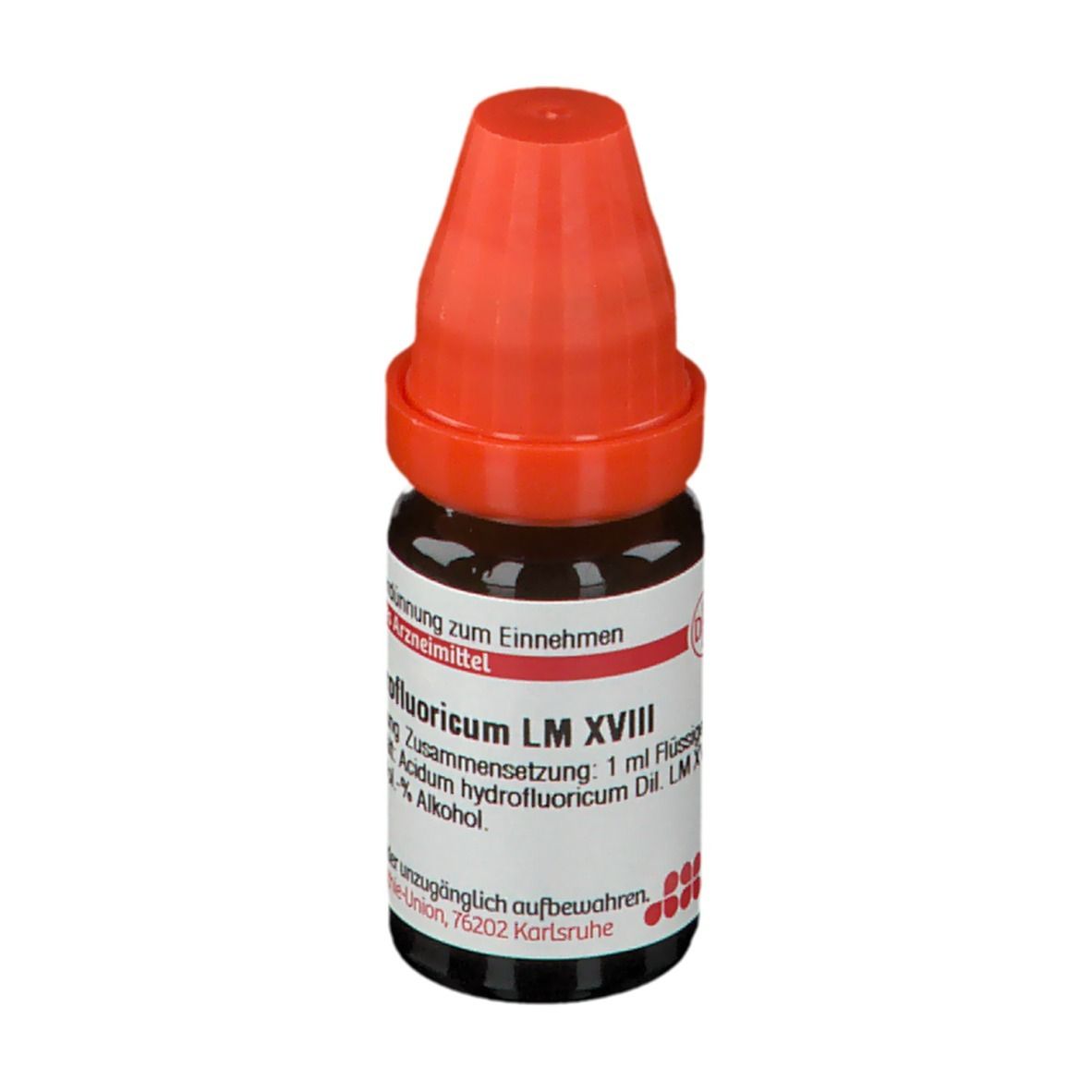 Braune Glasflasche mit rotem Verschluss. Beschriftung: Acidum hydrofluoricum LM XVIII, 10 ml flüssige Verdünnung.