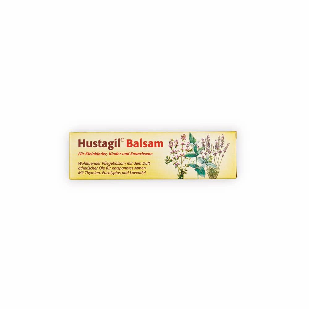 Hustagil® Balsam-Verpackung. Gelbe Schachtel mit Produktnamen und floralen Illustrationen.