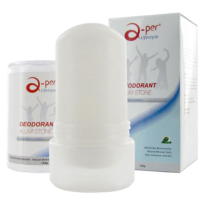 Deodorant-Stift und Verpackung. Weißer Stift, zylindrisch. Aufschrift: a-per lifestyle, Deodorant Alum Stone. Verpackung mit Logo und Text.
