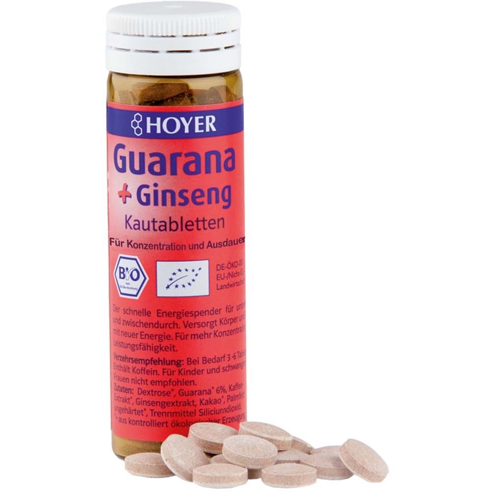 Braune Tabletten neben einer Flasche HOYER Guarana + Ginseng Kautabletten. Flasche mit weißem Deckel, rotem Etikett.
