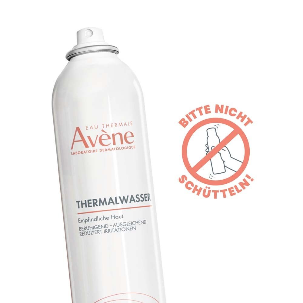 Weiße Flasche Avène Thermalwasser Spray. Text: Bitte nicht schütteln! Rotes Verbotsschild.