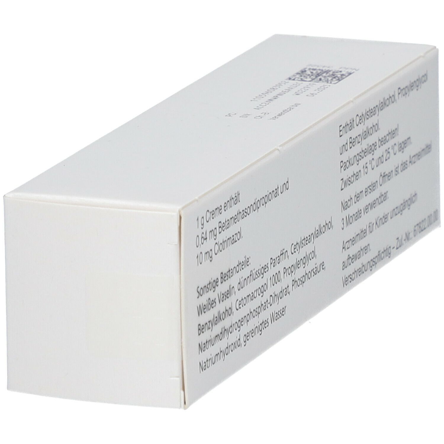 Rückseite der Lotriderm Creme-Verpackung, schräg. Weißer Karton mit Text. Beschriftung: Inhaltsstoffe, 30 g Creme.