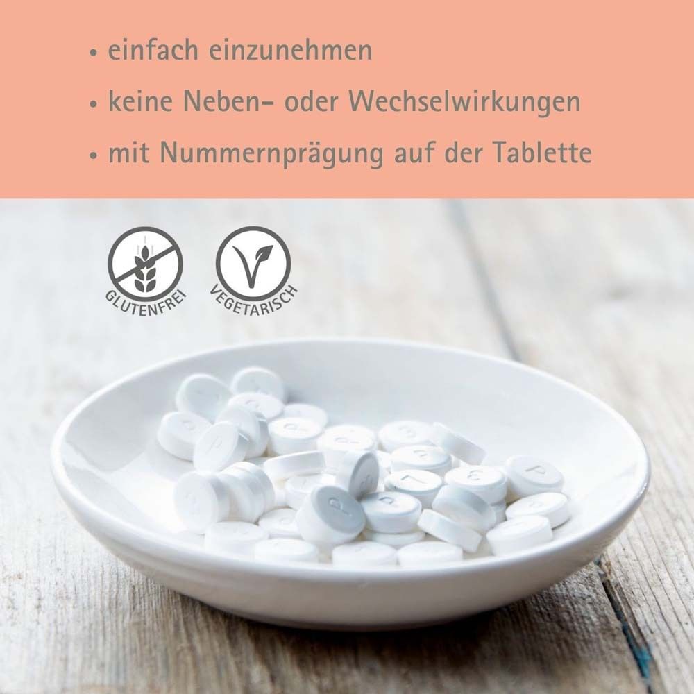 Weiße Tabletten in Schale. Text: glutenfrei, vegetarisch. Text: mit Nummerprägung auf der Tablette.