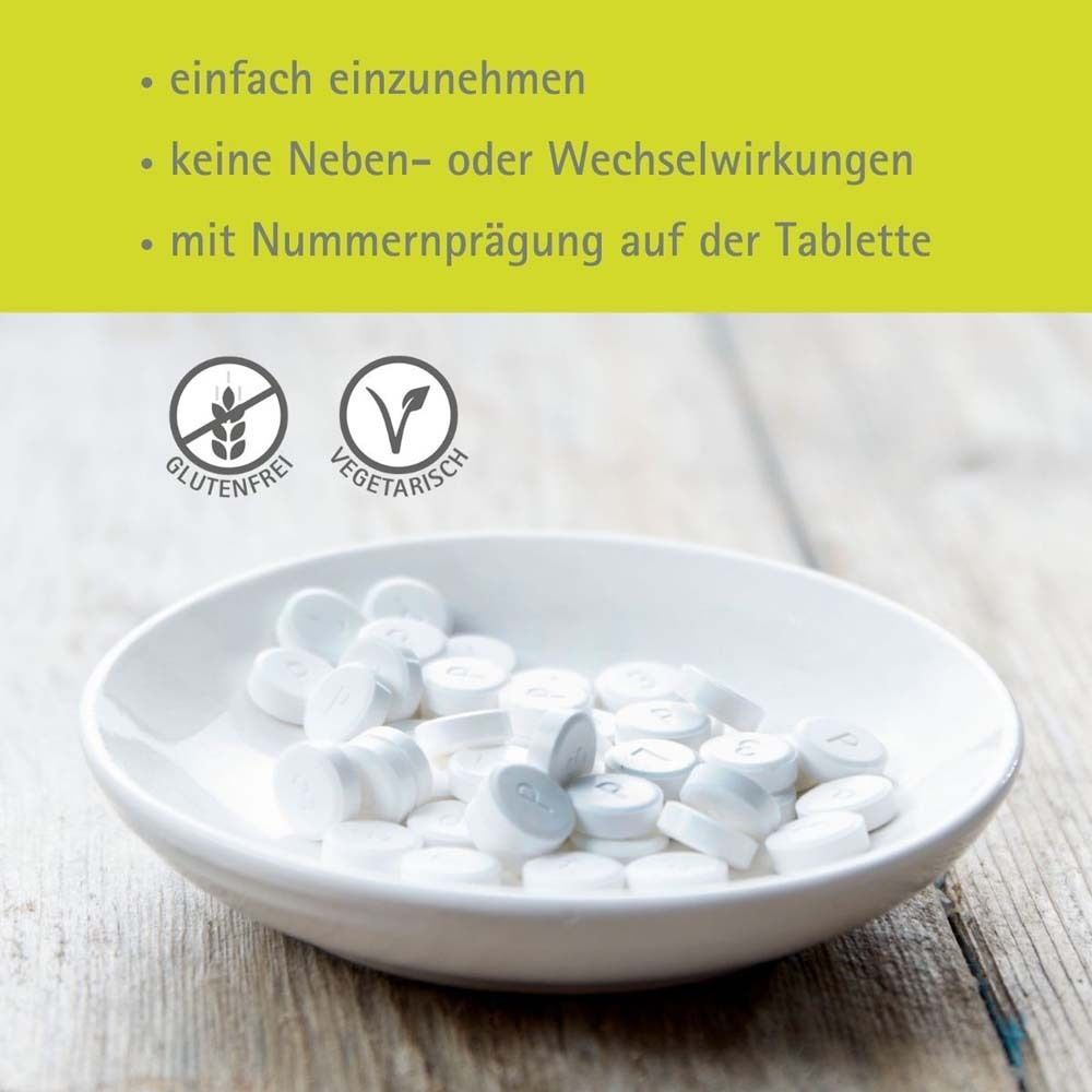 Weiße Tabletten in einer weißen Schale. Glutenfrei und vegetarisch. Aufschrift: einfach einzunehmen.
