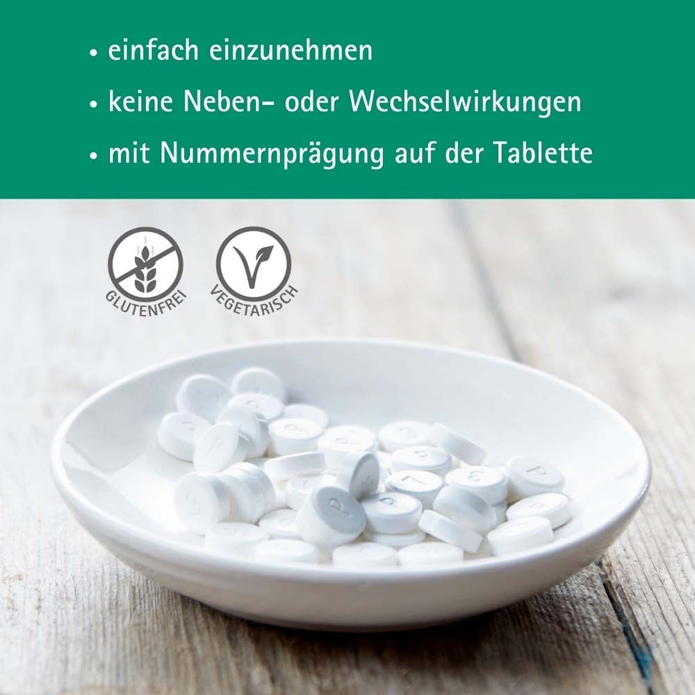 Weiße Tabletten in einer Schale. Text: Glutenfrei, vegetarisch. Text: einfach einzunehmen, keine Nebenwirkungen, mit Nummer.