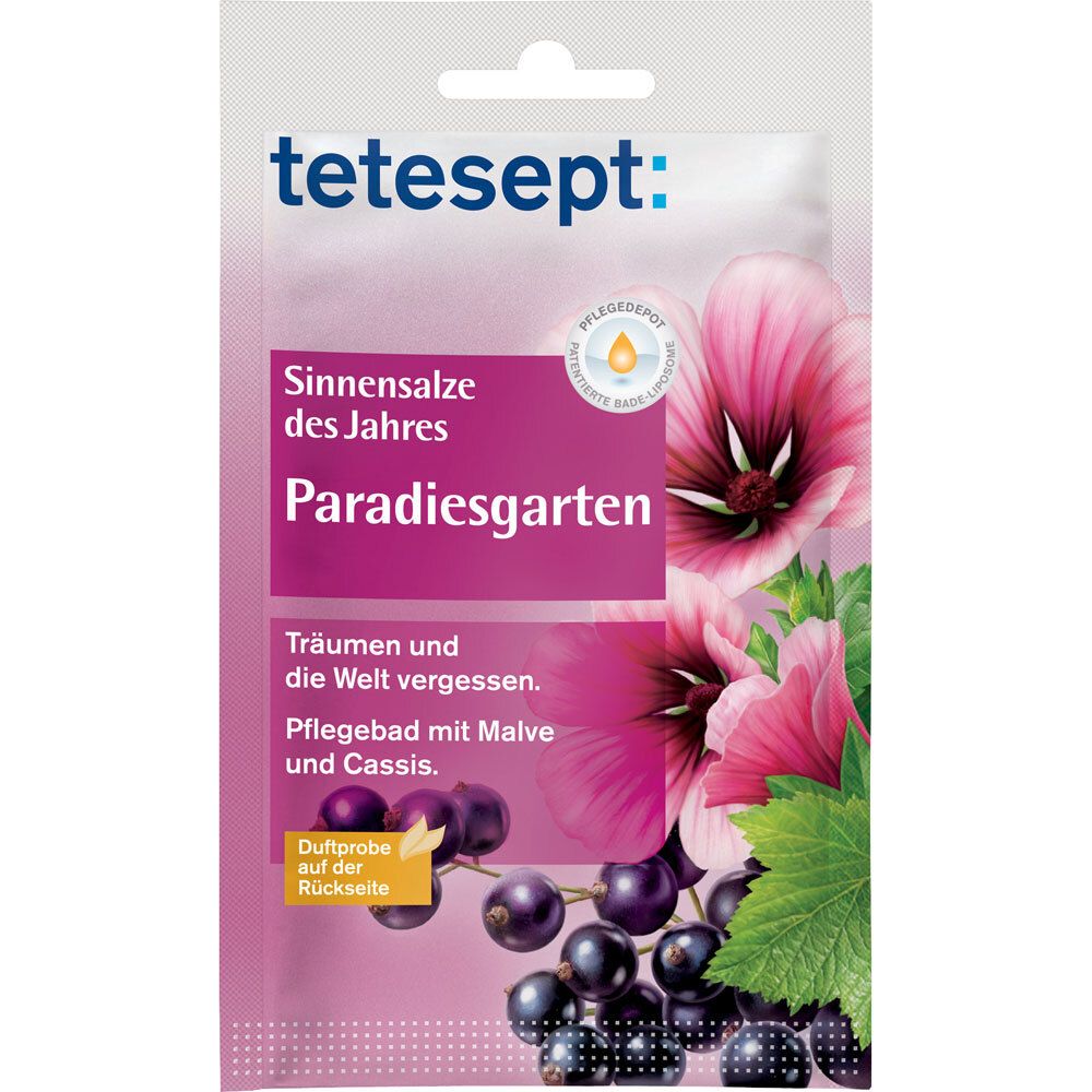 Verpackung mit Produktnamen und floralen Illustrationen. Text: Sinnensalze des Jahres Paradiesgarten, Pflegebad mit Malve und Cassis.