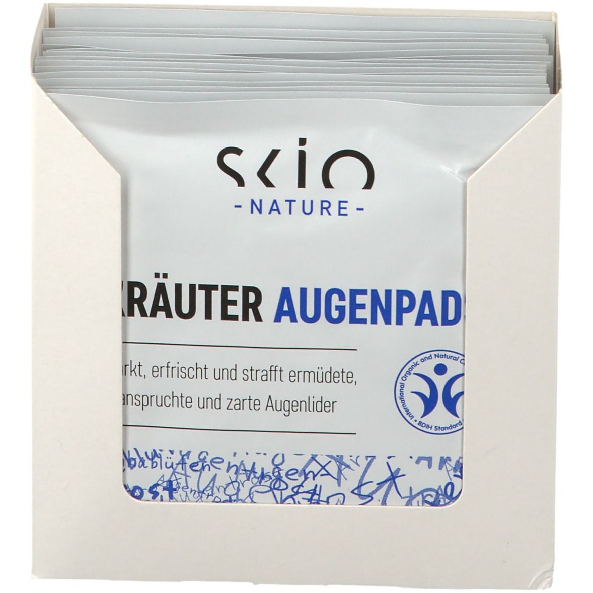 Verpackung mit Augenpads. Aufschrift: Scio - NATURE - Kräuter Augenpad. Logo: Organic and Natural Cosmetics.
