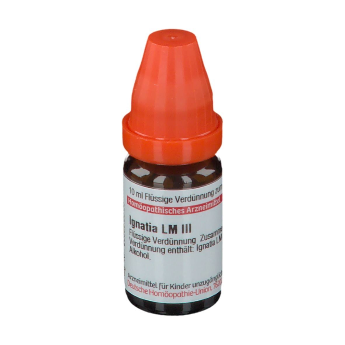 Braune Glasflasche mit orangefarbenem Verschluss. Beschriftung: Ignatia LM III, 10 ml Flüssige Verdünnung.