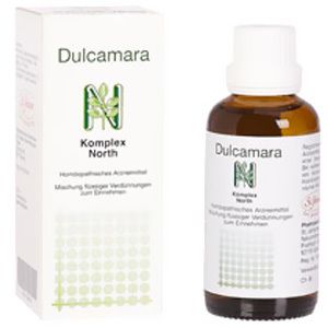 Weißer Karton und braune Glasflasche mit Etiketten. Aufschrift: Dulcamara, Komplex North, Logo.