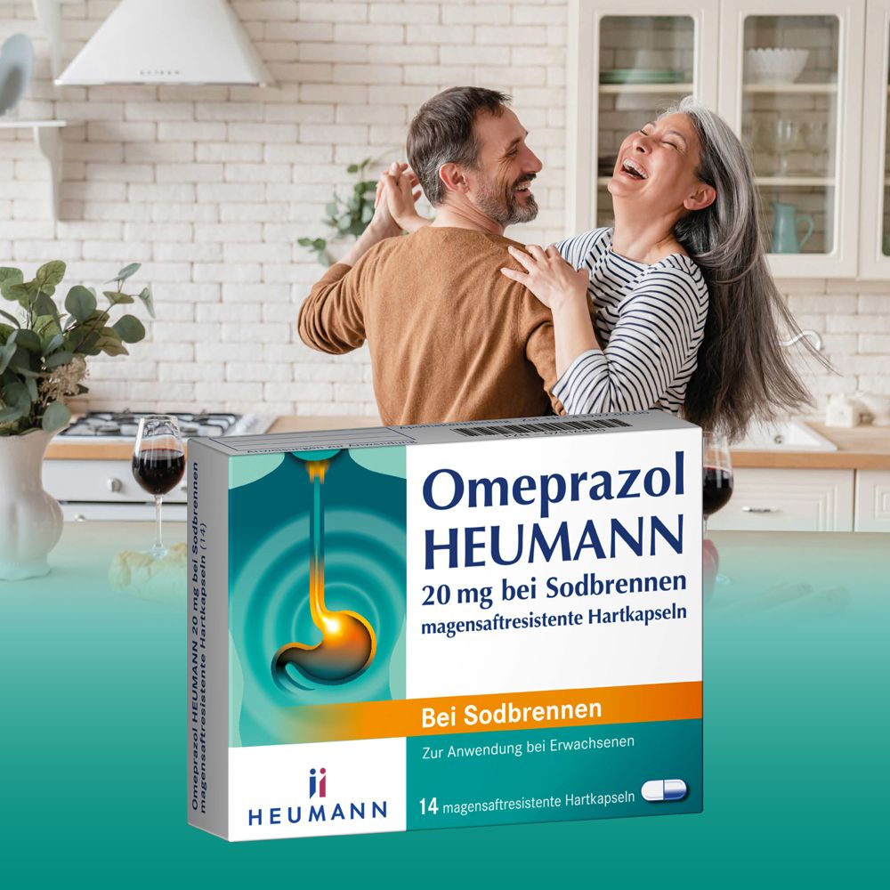 Produktverpackung Omeprazol Heumann 20 mg. Paar tanzt. 14 magensaftresistente Hartkapseln. Heumann Logo.