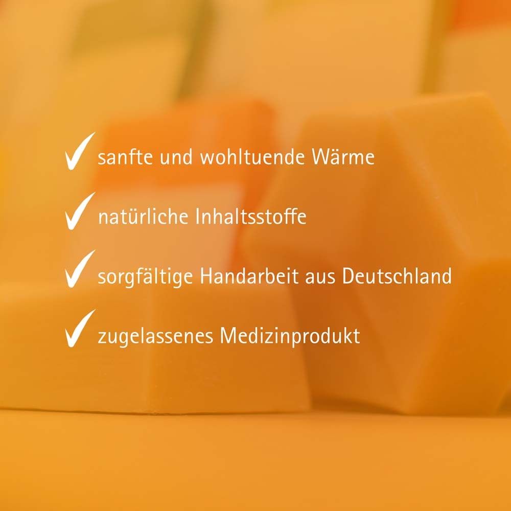Produktmerkmale: Sanfte Wärme, natürliche Inhaltsstoffe, sorgfältige Handarbeit, zugelassenes Medizinprodukt. Gelbe Blöcke.