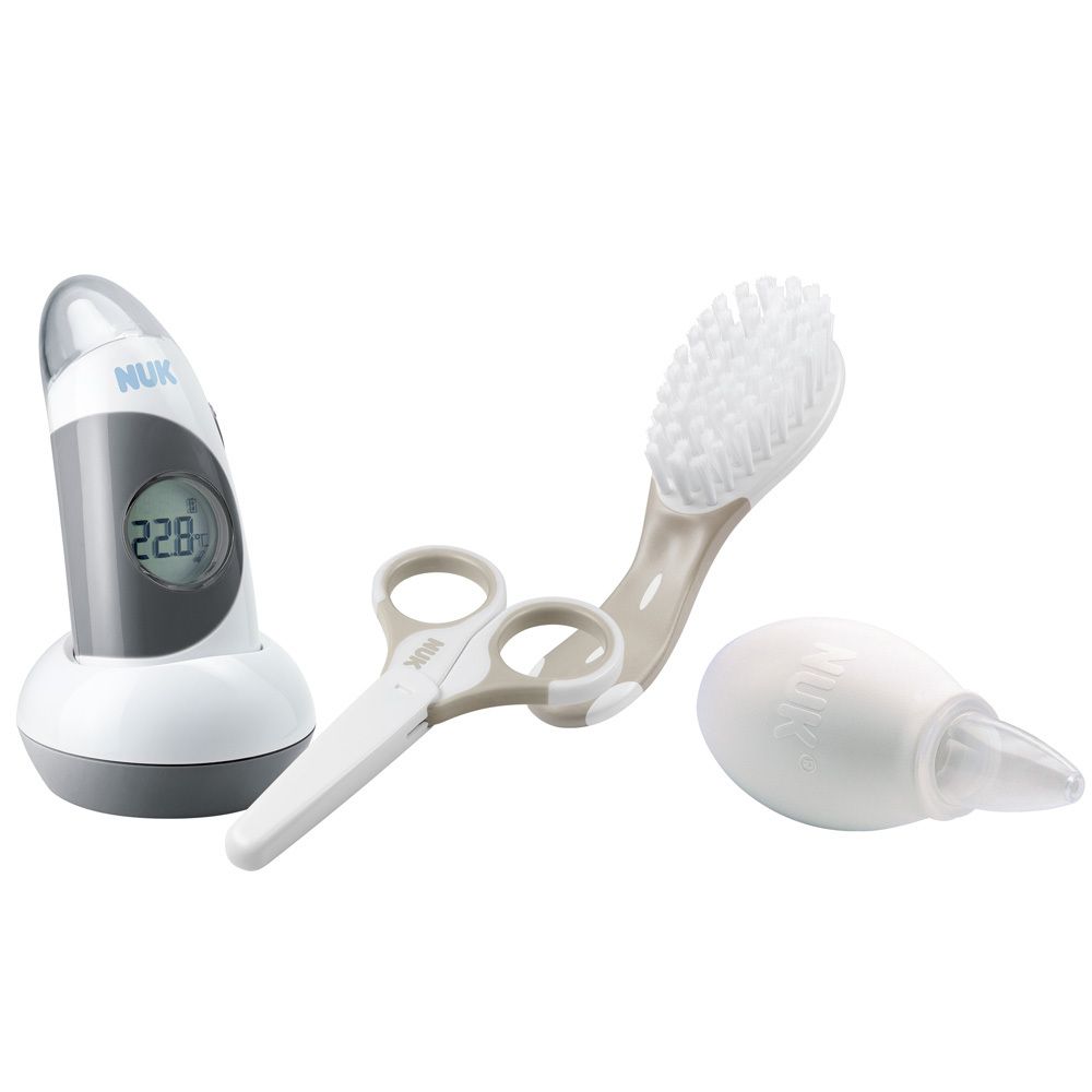 Pflegeset mit Fieberthermometer, Babybürste, Nagelschere und Nasensauger. Alle Artikel sind weiß und grau.
