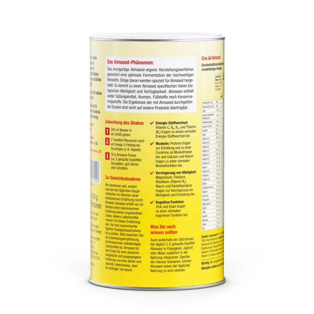 Rückseite einer Dose Almased Vital-Pflanzen-Eiweißkost. Gelber Hintergrund, weiße Schrift. Text über Almased-Phänomen und Nährwerte.