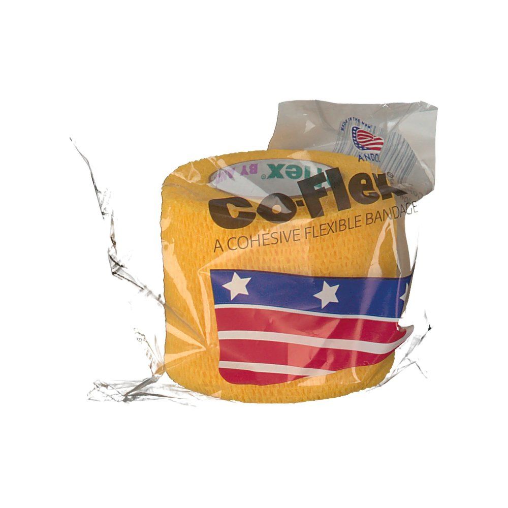 Gelbe Bandage in transparenter Verpackung. Aufdruck: CoFlex, amerikanische Flagge. 'A cohesive flexible bandage'.