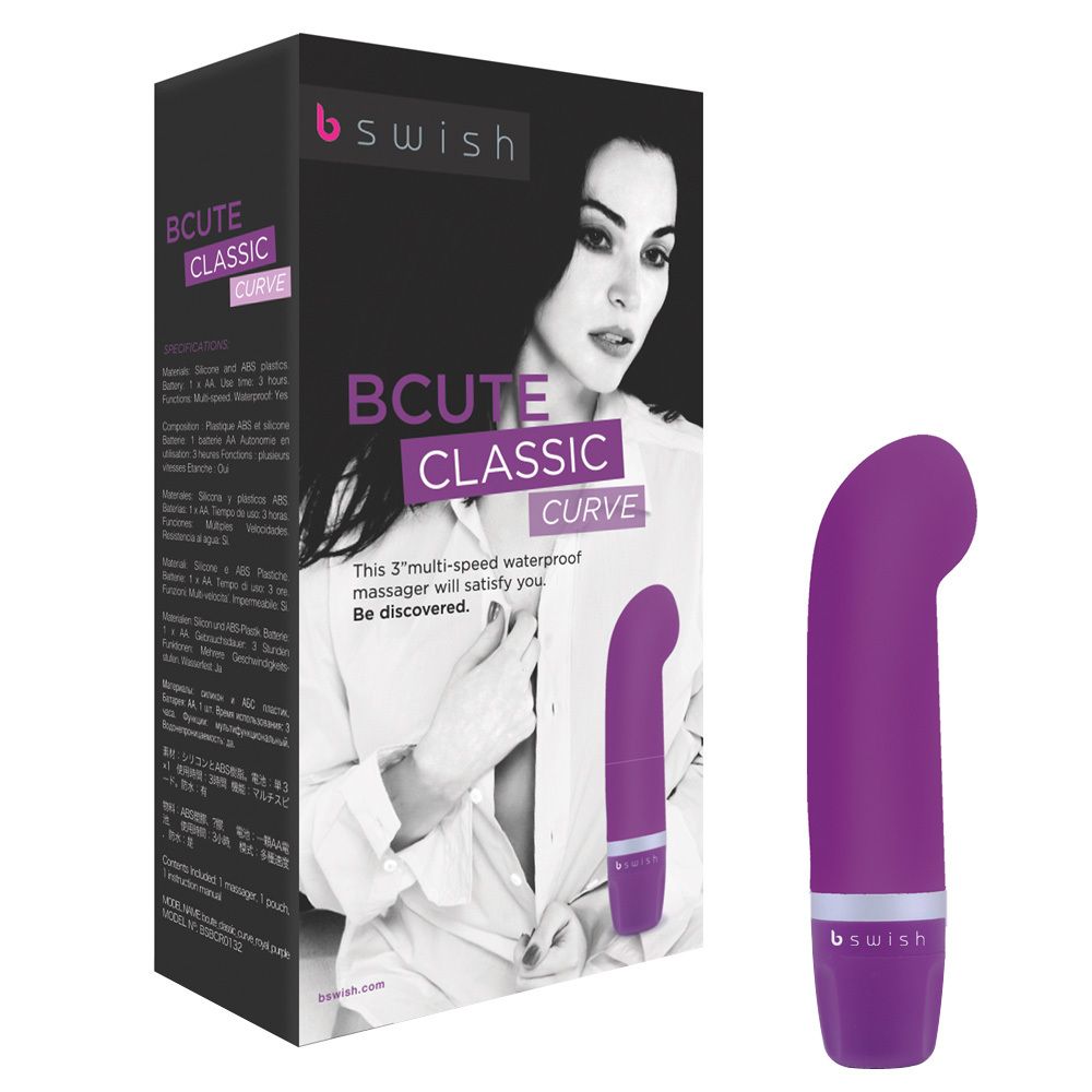 Lila Massagegerät mit Verpackung. Das Gerät ist gebogen und hat einen breiten Kopf.