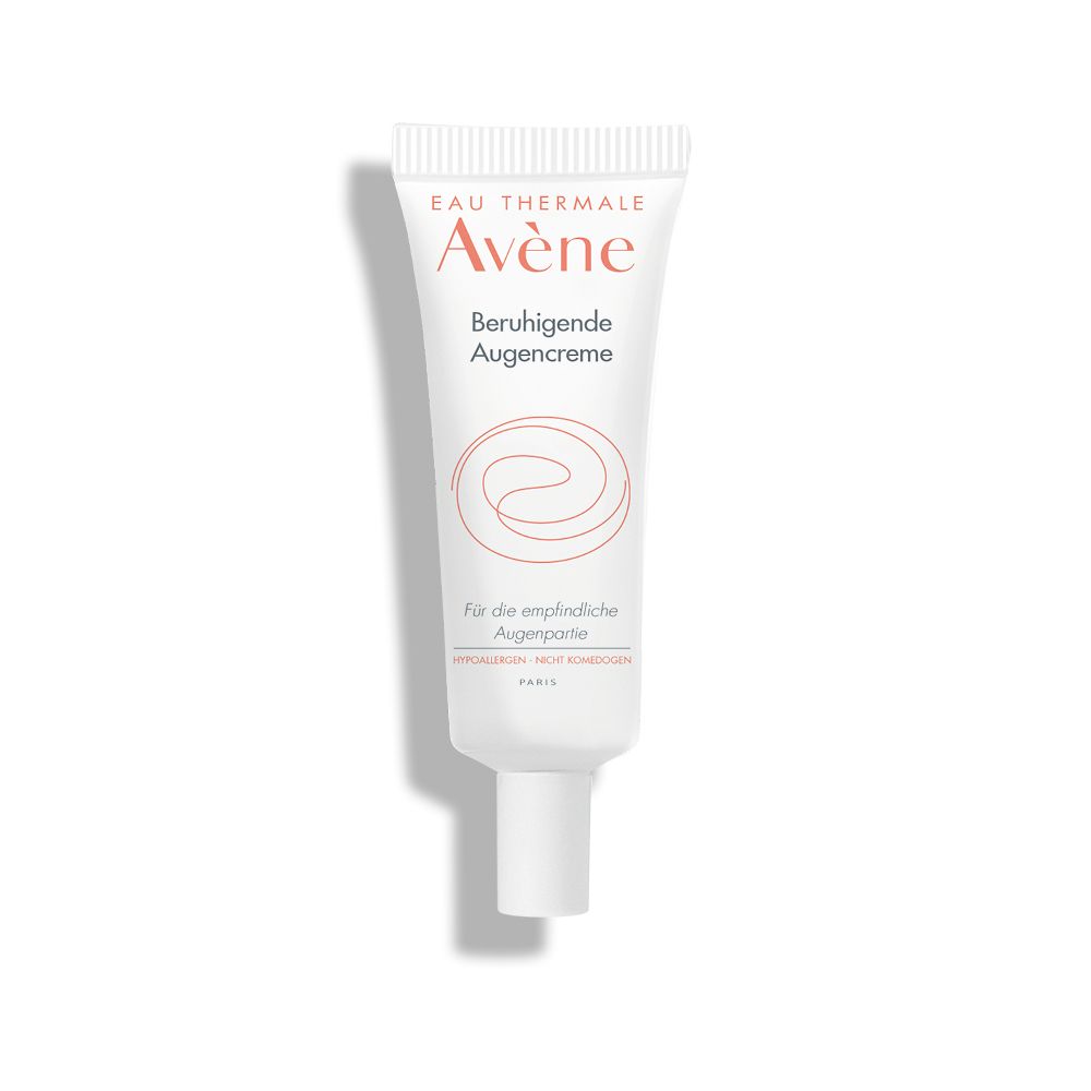 Weiße Tube mit rotem Schriftzug 'Avène' und Produktbezeichnung. Aufdruck: 'Beruhigende Augencreme'.