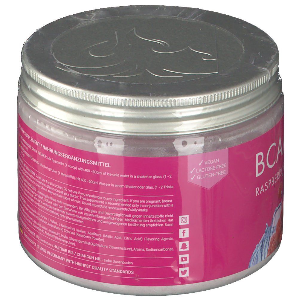 BCAA Amino-Dose. Rosa Etikett mit Text und Logos. Aufschrift: Vegan, Gluten-Free, Dietary Supplement, Made in Germany.