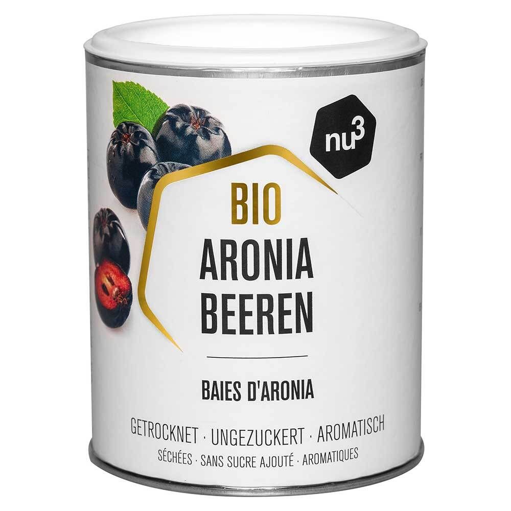 Boîte cylindrique avec l'inscription BIO Aronia Beeren. Représentation de baies d'aronia et d'une feuille. En haut à droite : logo nu3.