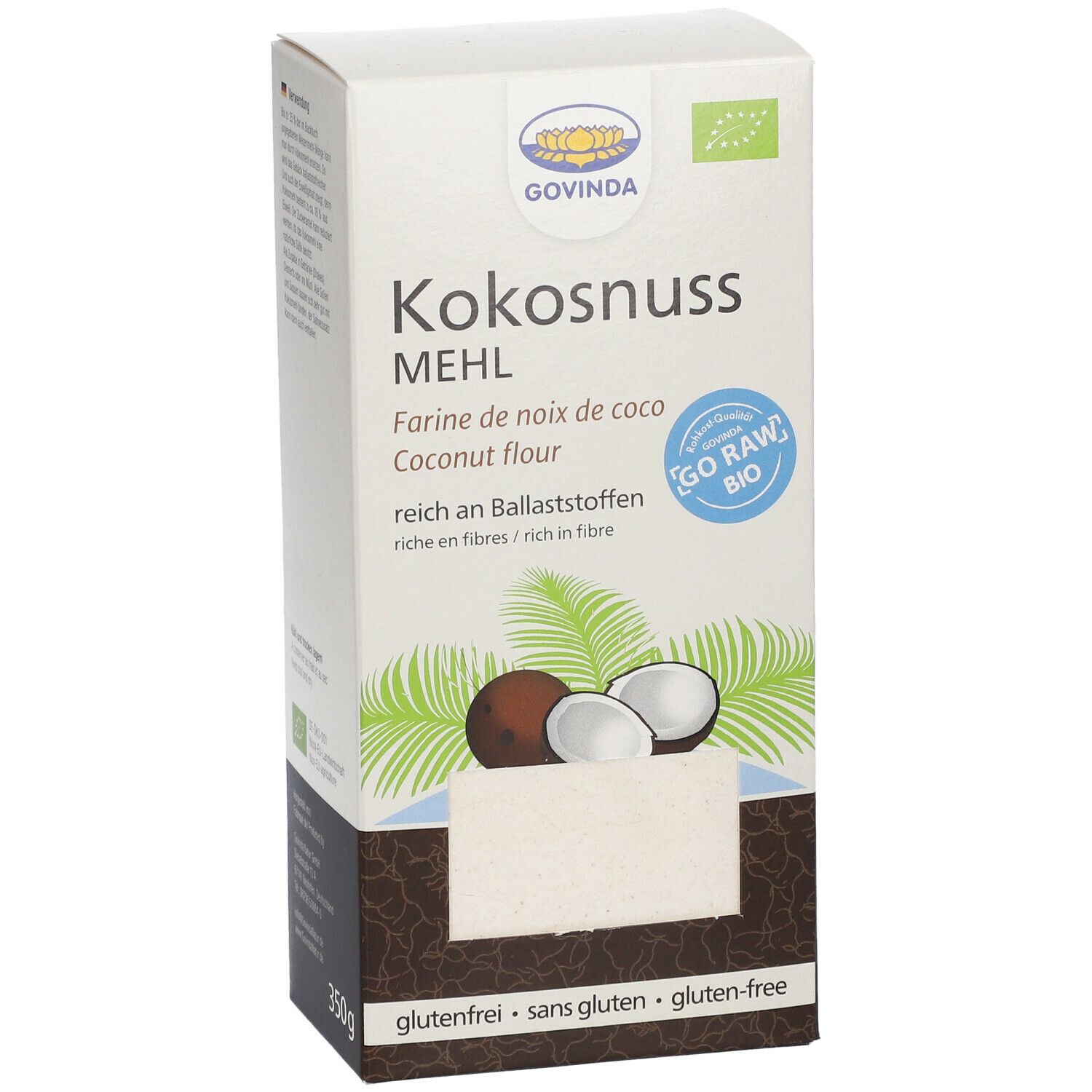 Karton mit Kokosnussmehl. Aufschrift: GOVINDA, Kokosnussmehl, glutenfrei. Abbildung von Kokosnuss und Blättern. 350g Gewicht.