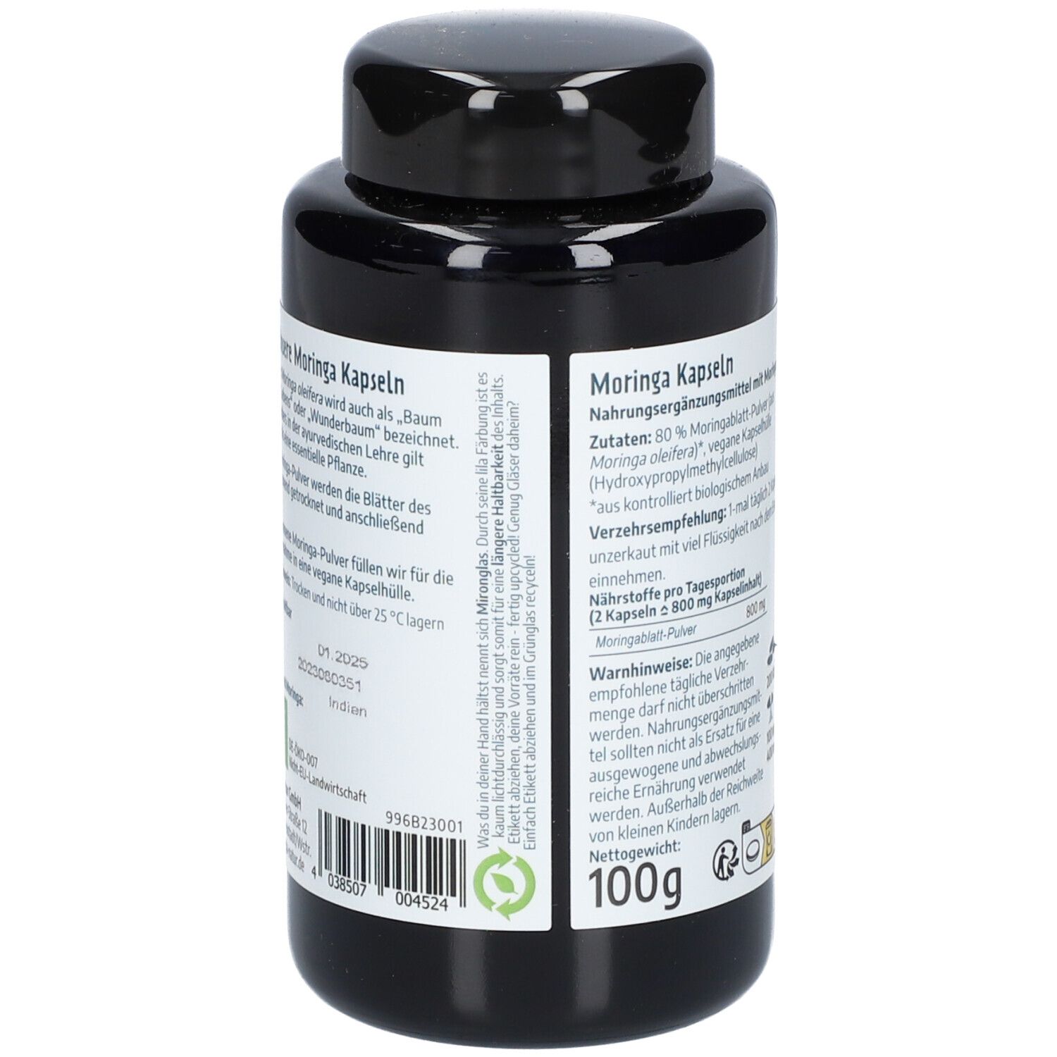 Rückseite der schwarzen Flasche mit Govinda Moringa Kapseln. Angaben zu Inhaltsstoffen, Dosierung und Gewicht.