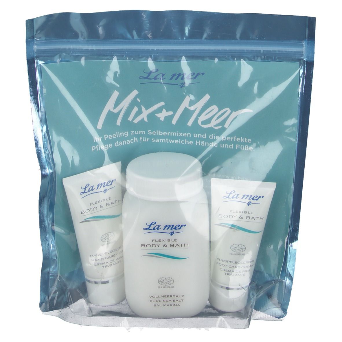 Set mit drei Produkten in einer transparenten Tasche. Enthält Tuben und eine Flasche mit dem Logo "La mer".