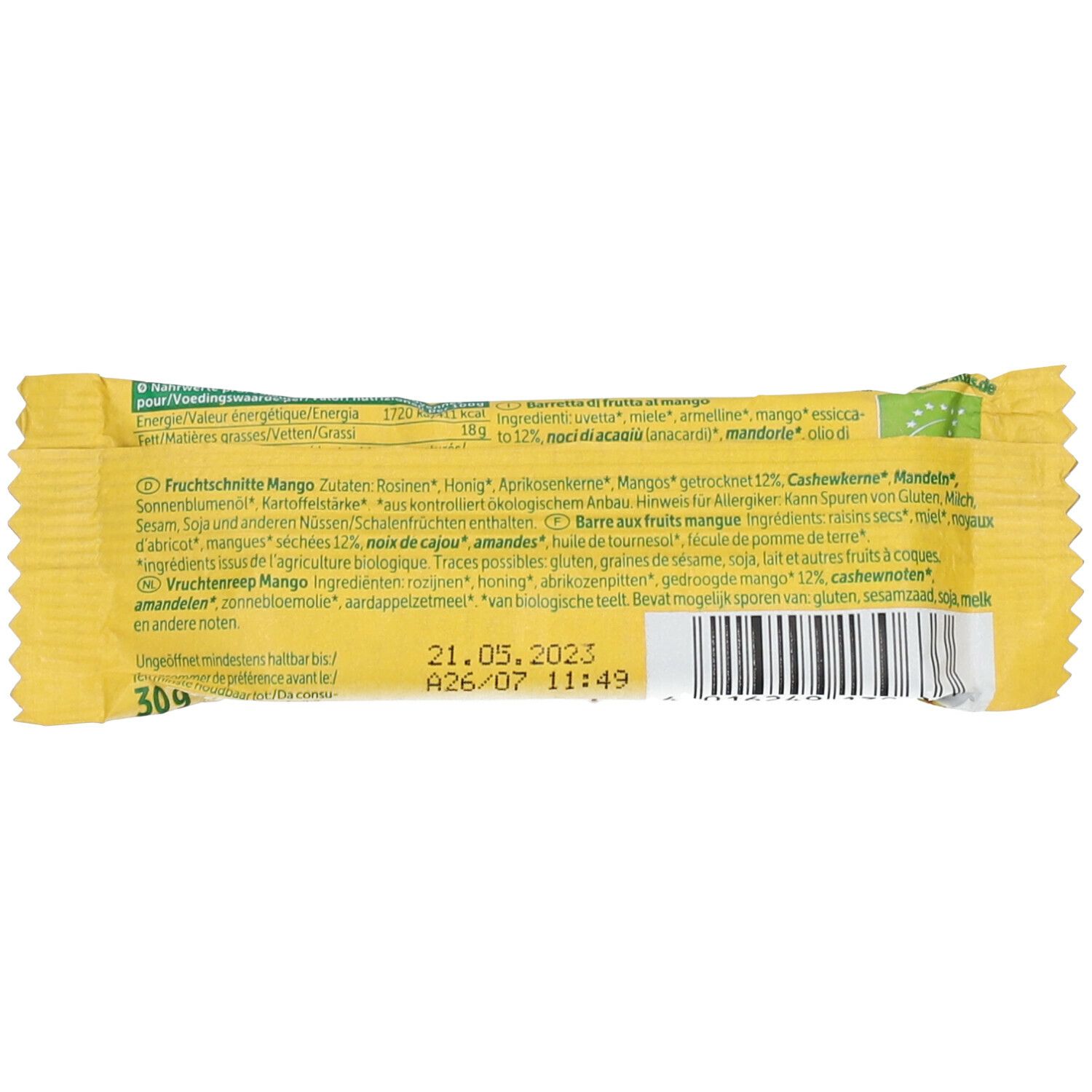 Rückseite der Allos Bio FRUCHTSCHNITTE Mango Verpackung. Zutatenliste, Nährwertangaben und Mindesthaltbarkeitsdatum.