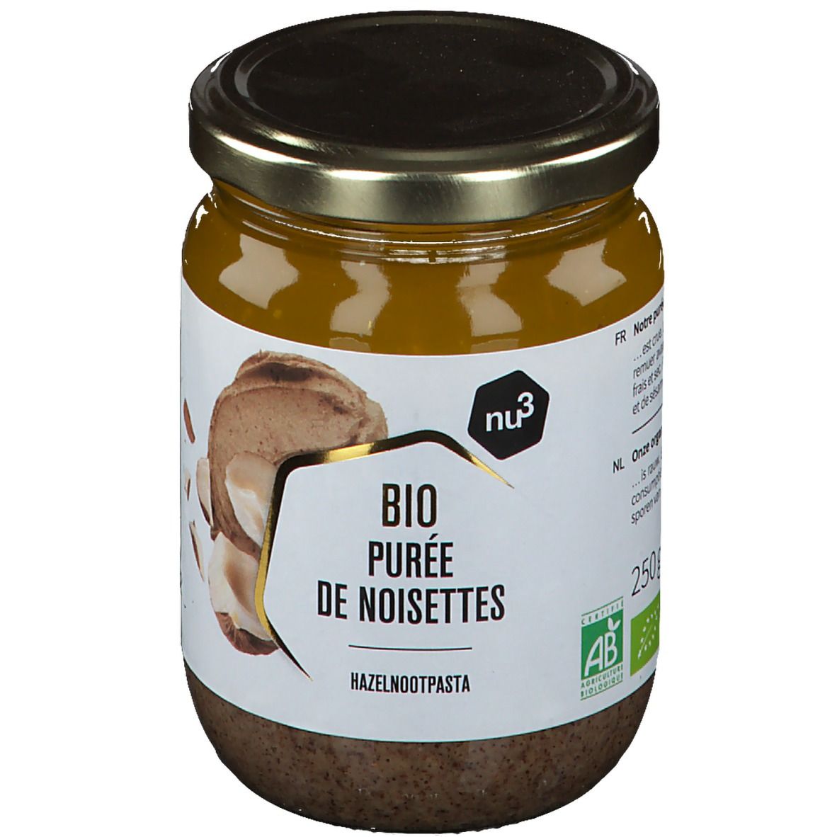 Pot de purée de noisettes. Étiquette avec nom du produit, marque et label bio. Illustration de noisettes.