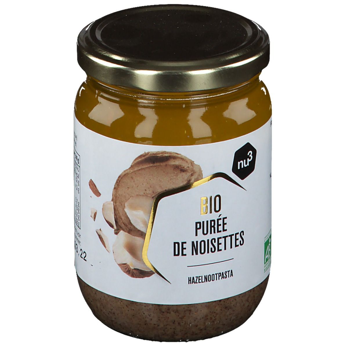 Pot de purée de noisettes. Étiquette avec nom du produit, marque et label bio. Illustration de noisettes.