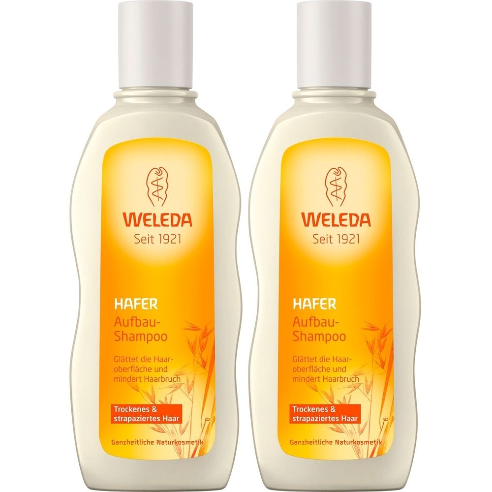 Zwei Flaschen Shampoo. Aufdruck: WELEDA, HAFER Aufbau-Shampoo. Für trockenes und strapaziertes Haar. Mit weißem Deckel und gelbem Etikett.