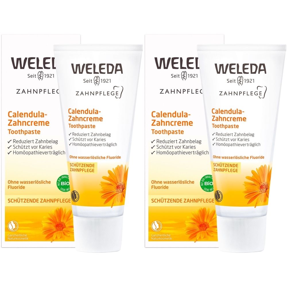 Mehrere Tuben und Faltschachteln Zahnpasta. Aufdruck: Weleda, Calendula-Zahncreme, schützende Zahnpflege, ohne Fluorid.