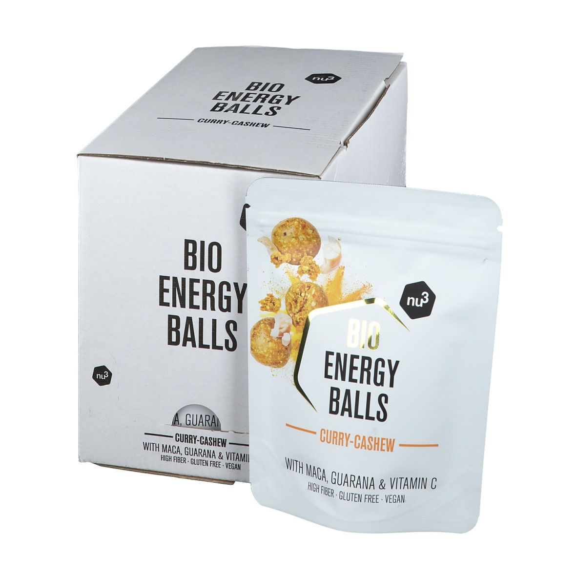Weiße Kartonverpackung und Beutel mit Aufschrift "BIO ENERGY BALLS Curry-Cashew". Beutel zeigt Produktabbildung und Zutaten.