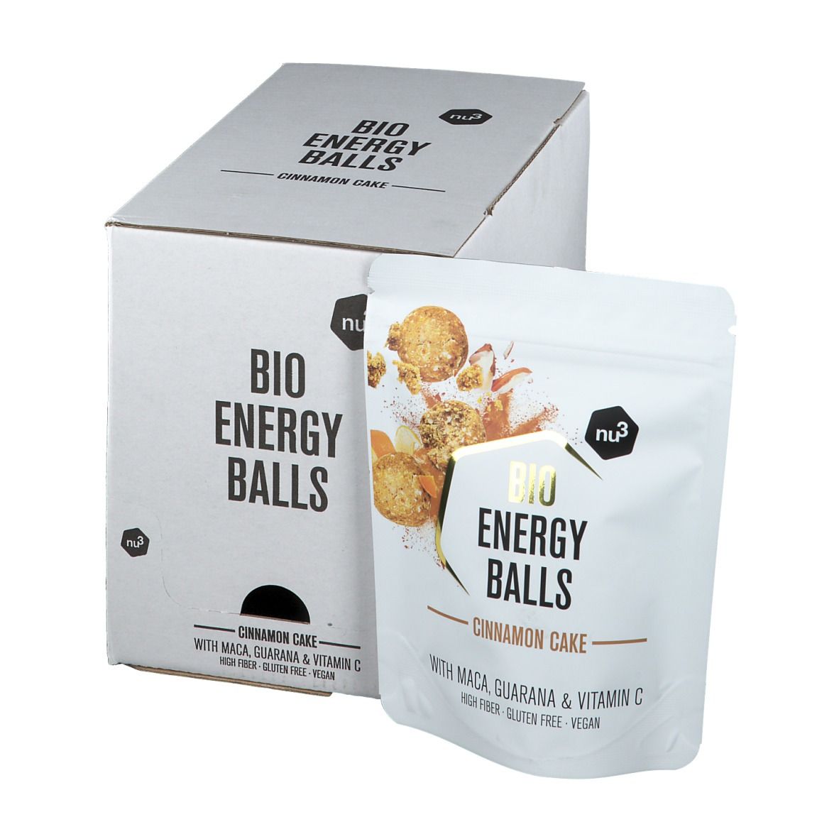 Emballage du produit avec "BIO ENERGY BALLS Cinnamon Cake". Inscriptions avec nom du produit, ingrédients et logo. Emballage blanc avec illustration du produit.