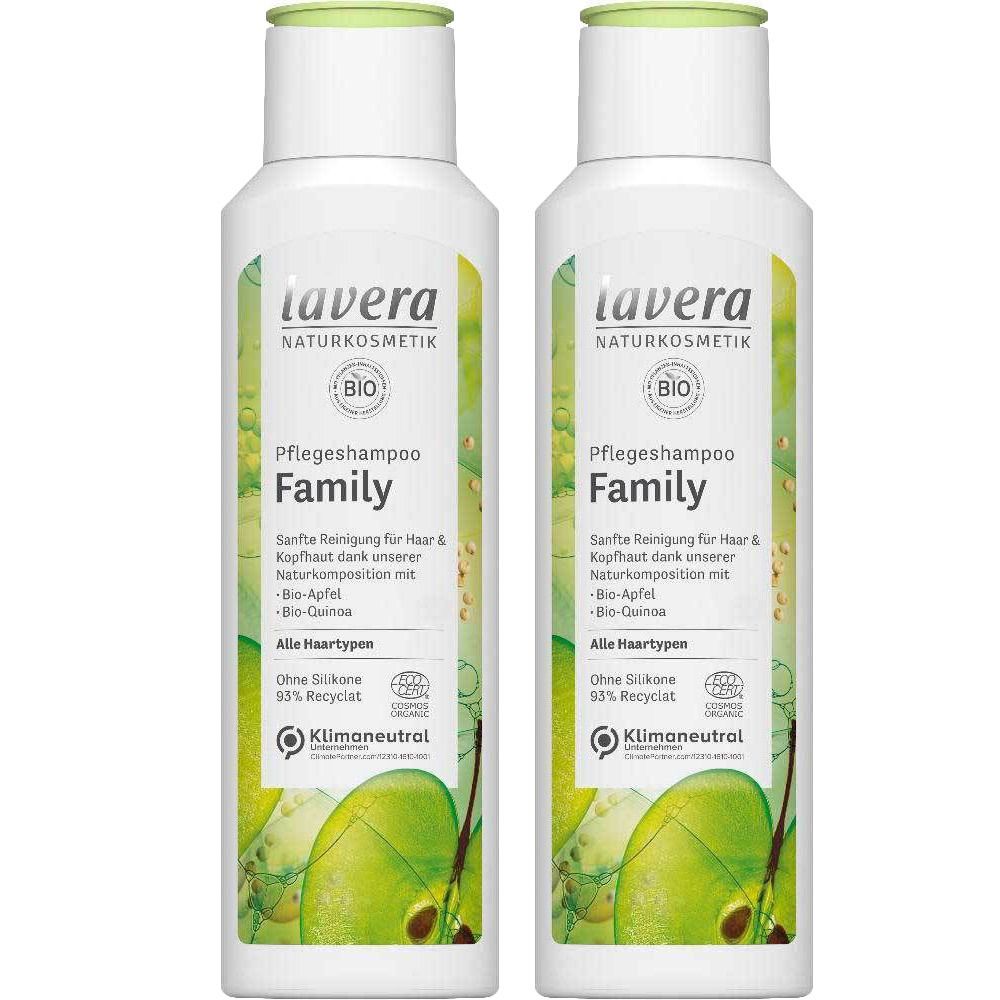 Zwei Flaschen Lavera Pflegeshampoo Family. Weiße Flaschen mit grünen Deckeln und Etiketten. Text: Lavera, BIO, Pflegeshampoo Family.