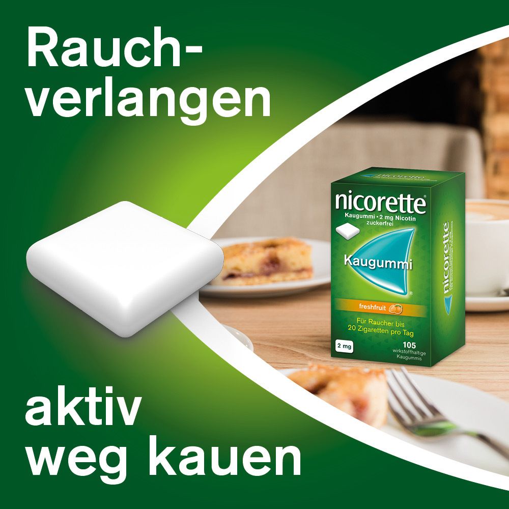 Kaugummi und Verpackung nicorette® auf Tisch. Text: Rauchverlangen, aktiv weg kauen.