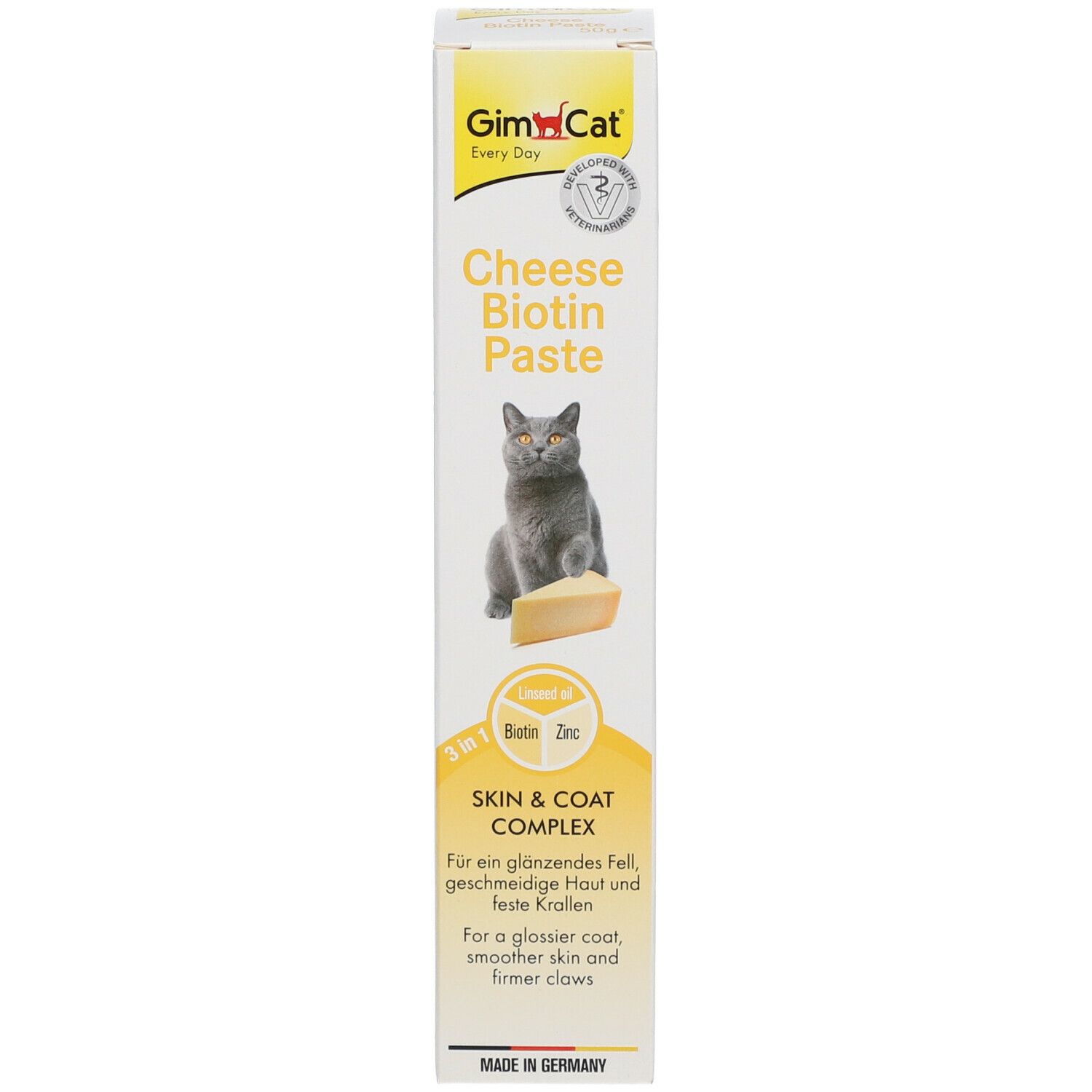 Verpackung GimCat Cheese Biotin Paste. Aufschrift: Cheese Biotin Paste, Linseed Oil, Biotin, Zinc, Skin & Coat. Katze mit Käse.