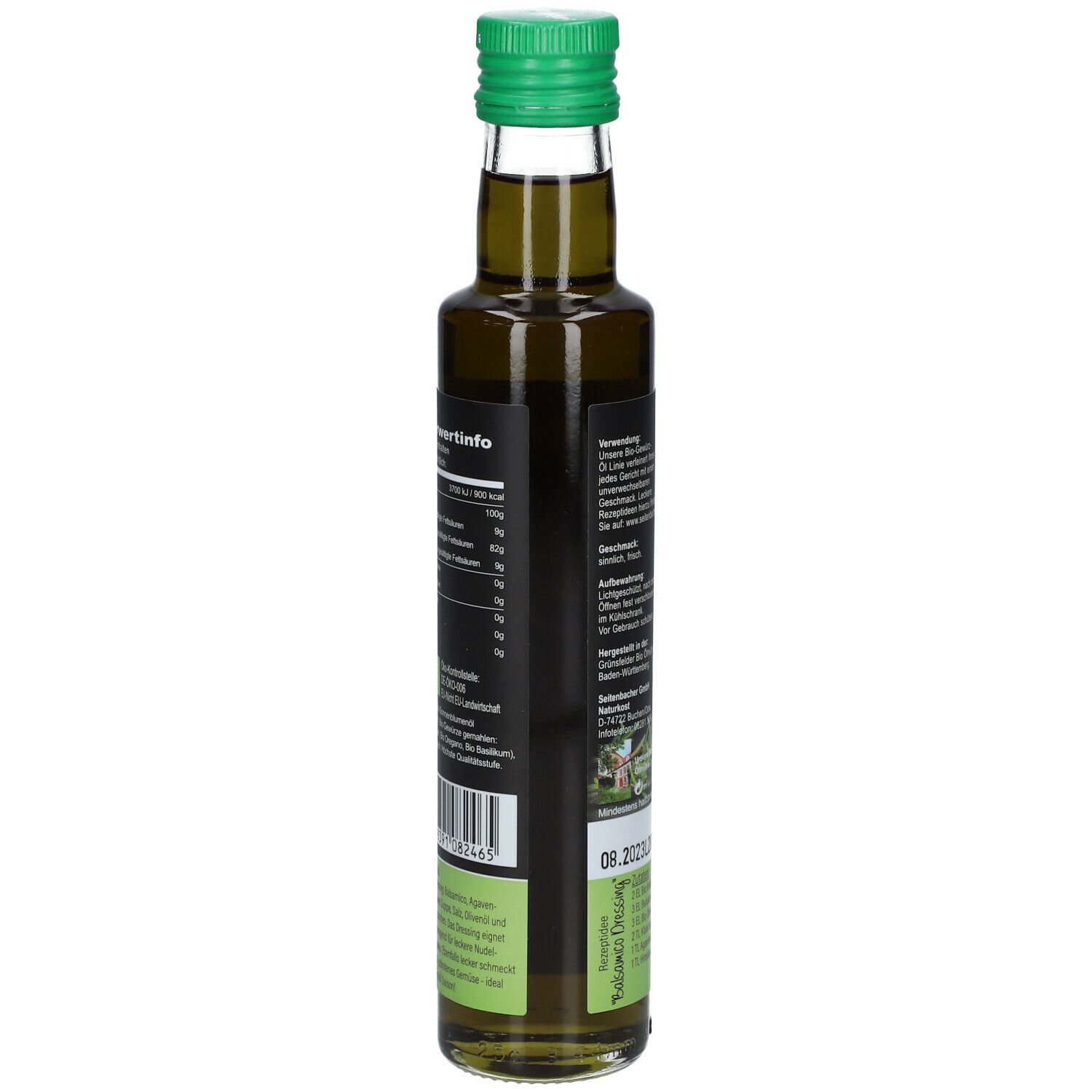Rückseite einer grünen Glasflasche mit grünem Deckel. Etikett mit Nährwertinformationen.