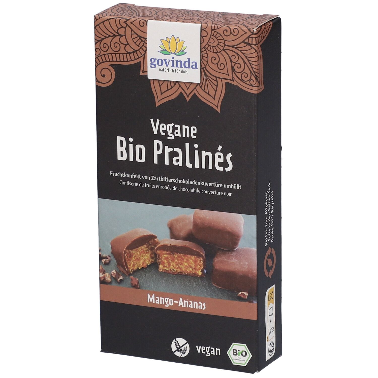 Verpackung von Govinda Vegane Bio Pralinés Mango-Ananas. Schwarze Schachtel mit Produktbild und Logo. Vegan und Bio-Siegel.