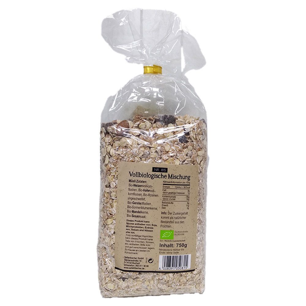 Transparente Tüte mit Müsli. Aufdruck "Vollbiologische Mischung". Text und Nährwertangaben. Inhalt: 750g. Bio-Siegel.